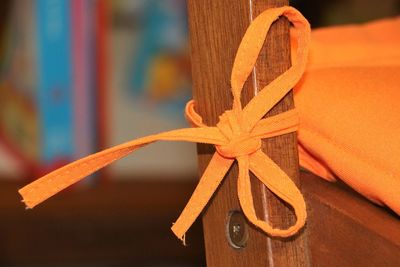 Close-up of christmas decorations on wood