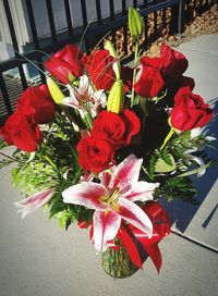 High angle view of red roses on table