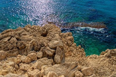 High angle view of rocks on beach