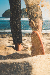 Low section of person on beach