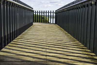 Wooden boardwalk and metal railings leading to the observation deck