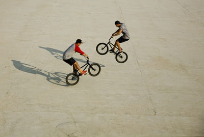 High angle view of man riding bicycle