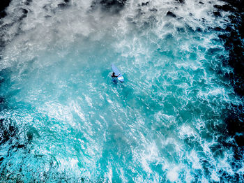 High angle view of people in sea