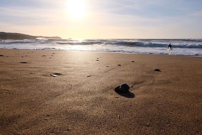 Scenic view of beach against sky