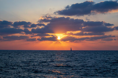 Scenic view of sea against sky during sunset