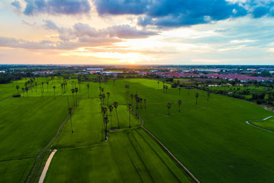 Scenic view of landscape against sky during sunset