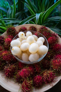 High angle view of fruits in plate on table