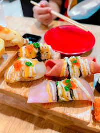 Close-up of sushi served on table