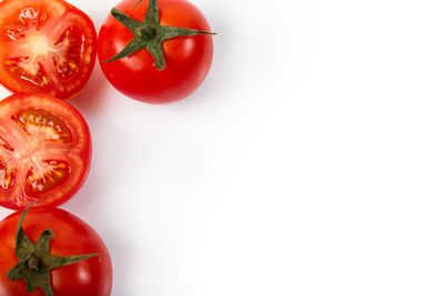 Close-up of fruits against white background