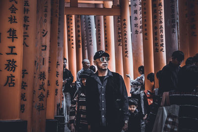 Young man standing in temple