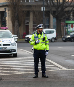 Full length of man standing on street