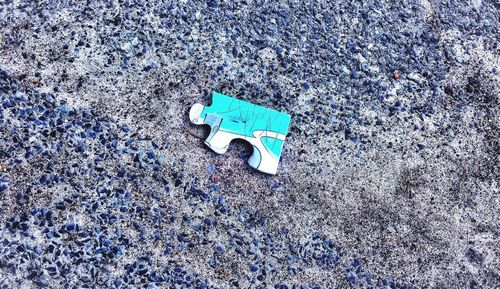 High angle view of toy on beach