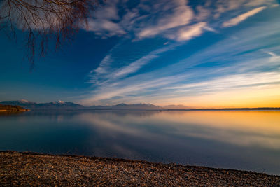 Reflection of clouds in calm lake