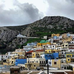 Town against cloudy sky