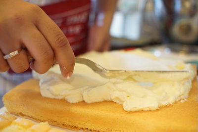 Close-up of woman preparing food