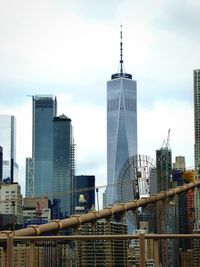 Modern buildings in city against sky