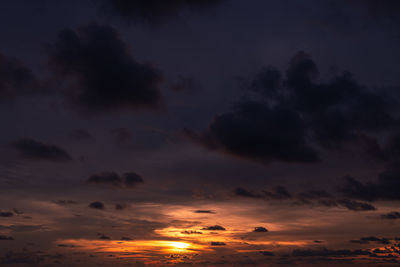 Low angle view of dramatic sky during sunset