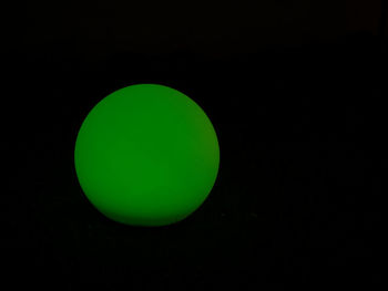 Close-up of multi colored lights against black background