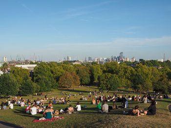 Group of people relaxing in park