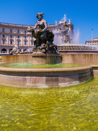 Statue of fountain in city