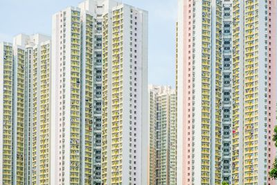 Modern buildings in city against sky