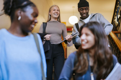Side view of young woman looking at gym