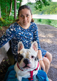 Portrait of woman with dog