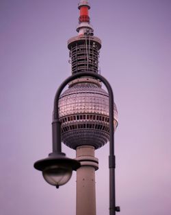 Low angle view of street light against clear sky with berlin tv tower in the background 