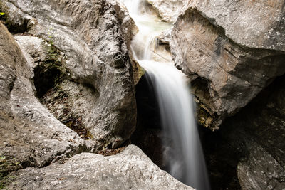 Close-up of waterfall on rock