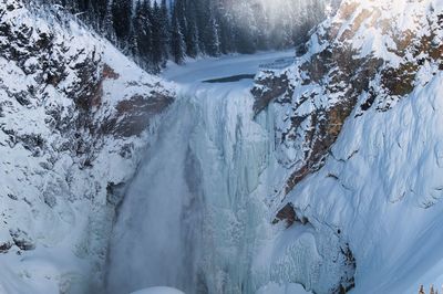 Scenic view of snowcapped mountains during winter