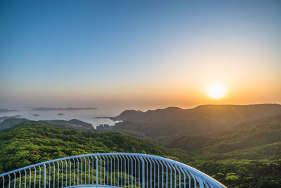 Scenic view of mountains against sky during sunset