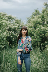 Portrait of smiling woman in nature