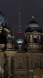Illuminated cathedral against sky at night