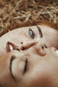 Close-up portrait of woman with friend