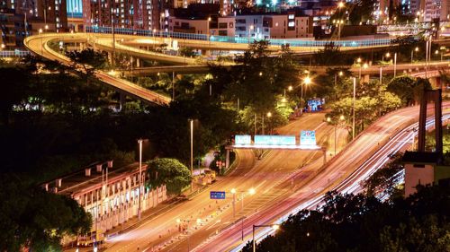 High angle view of light trails on city street