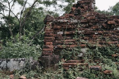 Exterior of old temple against building
