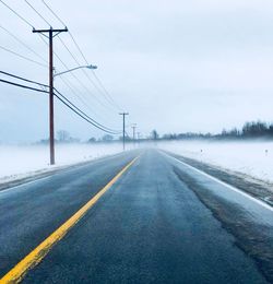 Road against sky during winter