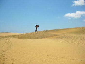 Full length of man in desert