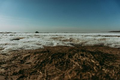 Scenic view of sea against clear sky