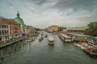 Canal passing through city buildings