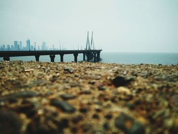 Bandra-worli sea link over sea against clear sky