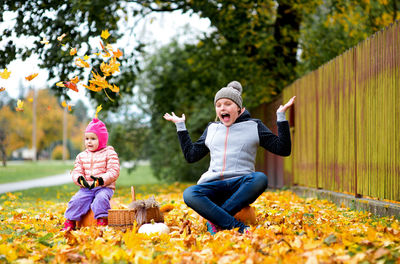 Siblings enjoying at park