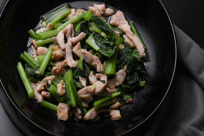 High angle view of meat in cooking pan