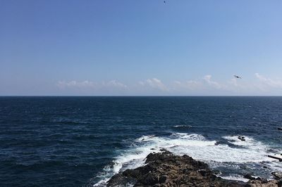 View of sea against blue sky