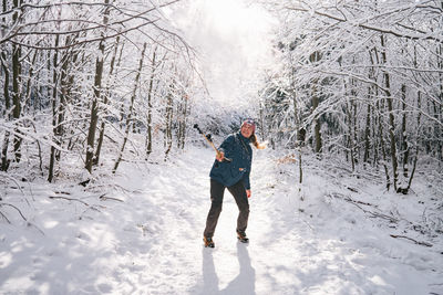 Full length of woman person on snow covered land