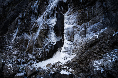 Rock formation on snow covered land