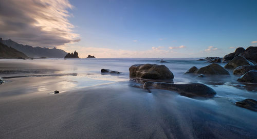 Scenic view of sea against sky during sunset