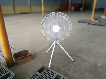 High angle view of electric fan on floor