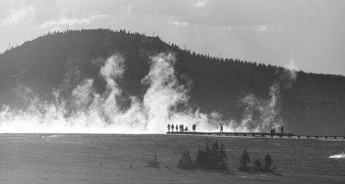 Panoramic view of steam emitting from hot spring