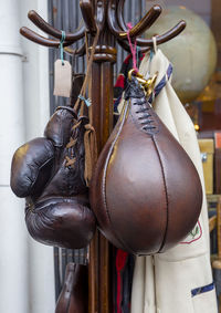 Close-up of sports equipment hanging from hooks